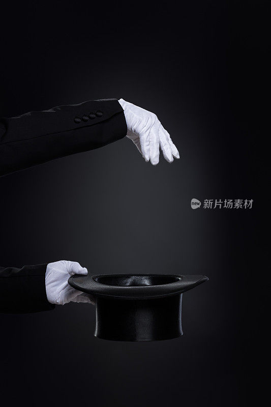 MagicianËhe’他的手戴着白手套和大礼帽